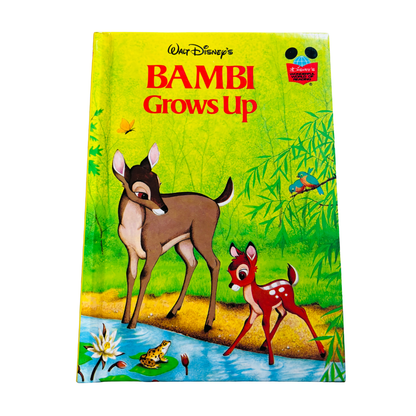 Book cover of 'Bambi Grows Up' with a deer and fawn on a green background