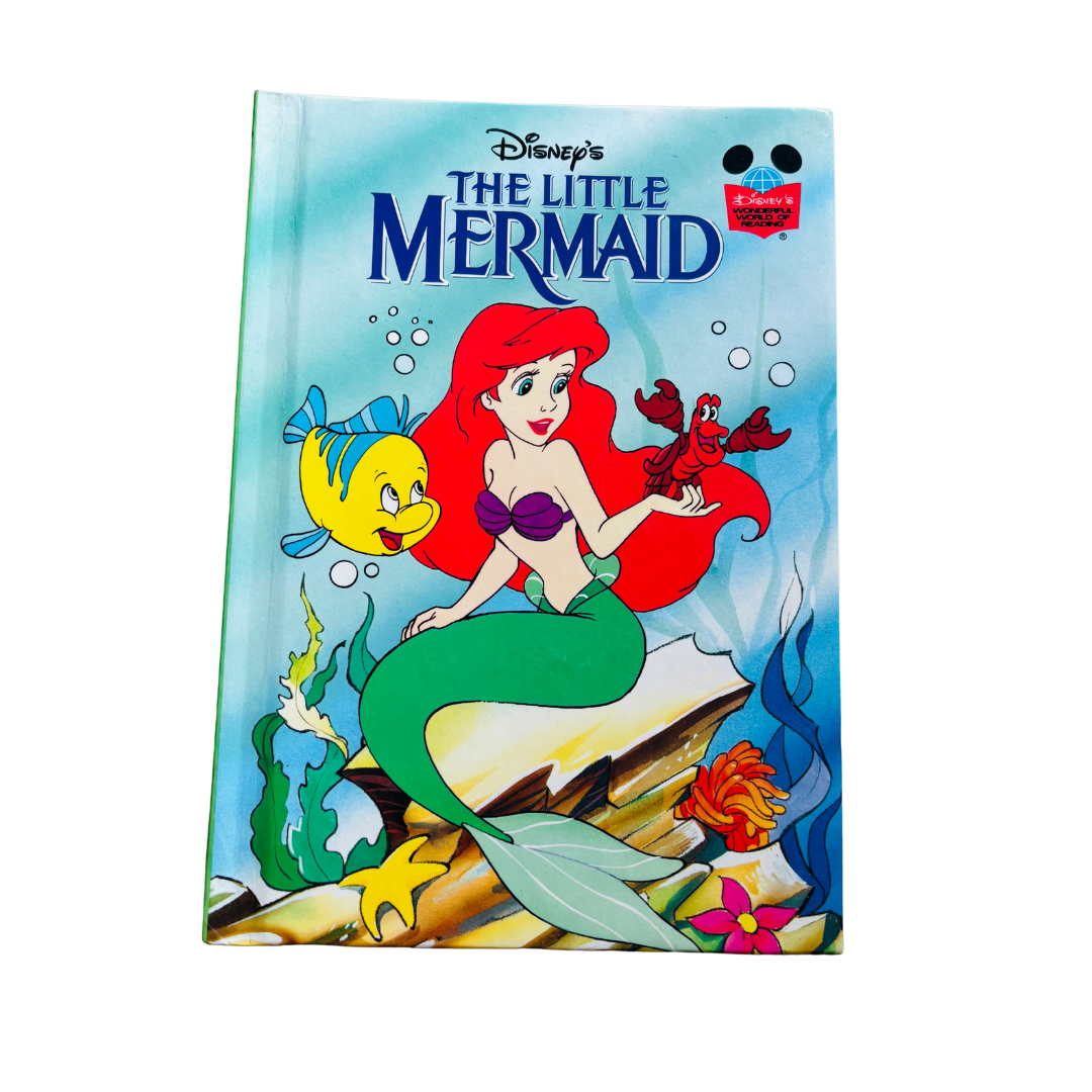 Notebook with 'The Little Mermaid' cover featuring Ariel and Flounder.