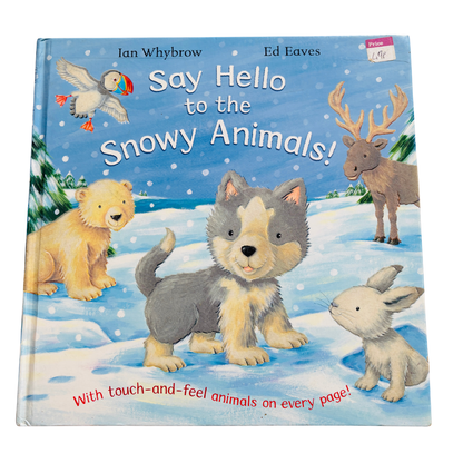 Children's book titled 'Say Hello to the Snowy Animals!' with illustrations of animals on a snowy background.