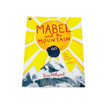 Book cover of 'Mabel and the Mountain' by Kim Hillyard with a sun and mountain design.