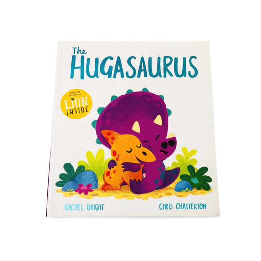 Children's book titled 'The Hugasaurus' with colorful illustration of two dinosaurs hugging on a white background.
